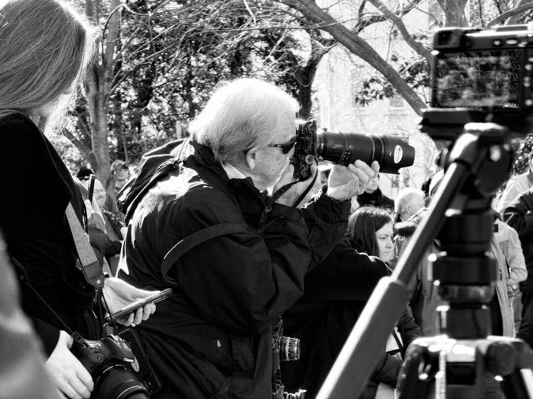photographer talking to elderly resident