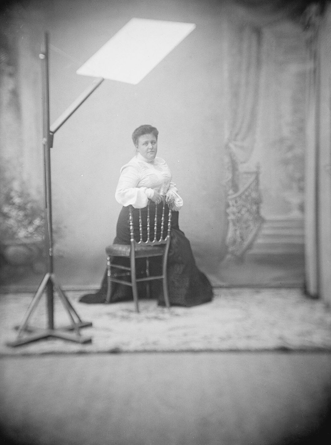 Studio portrait of a Danish woman photographer with short blonde hair